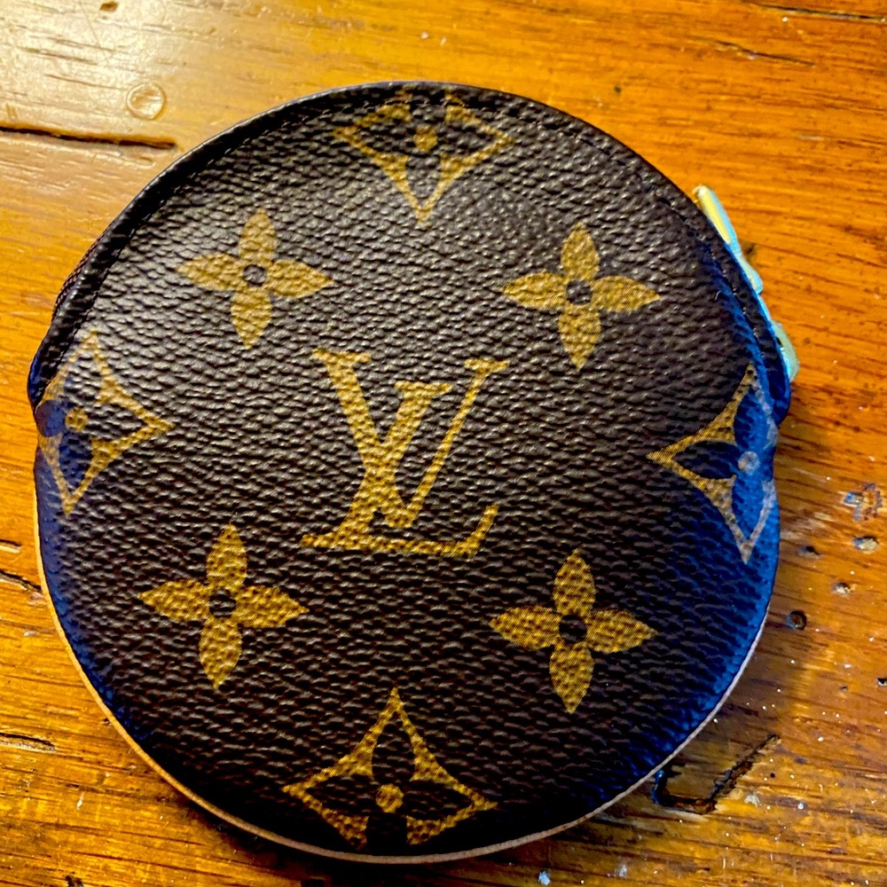 Louis Vuitton retired hard to find coin purse.